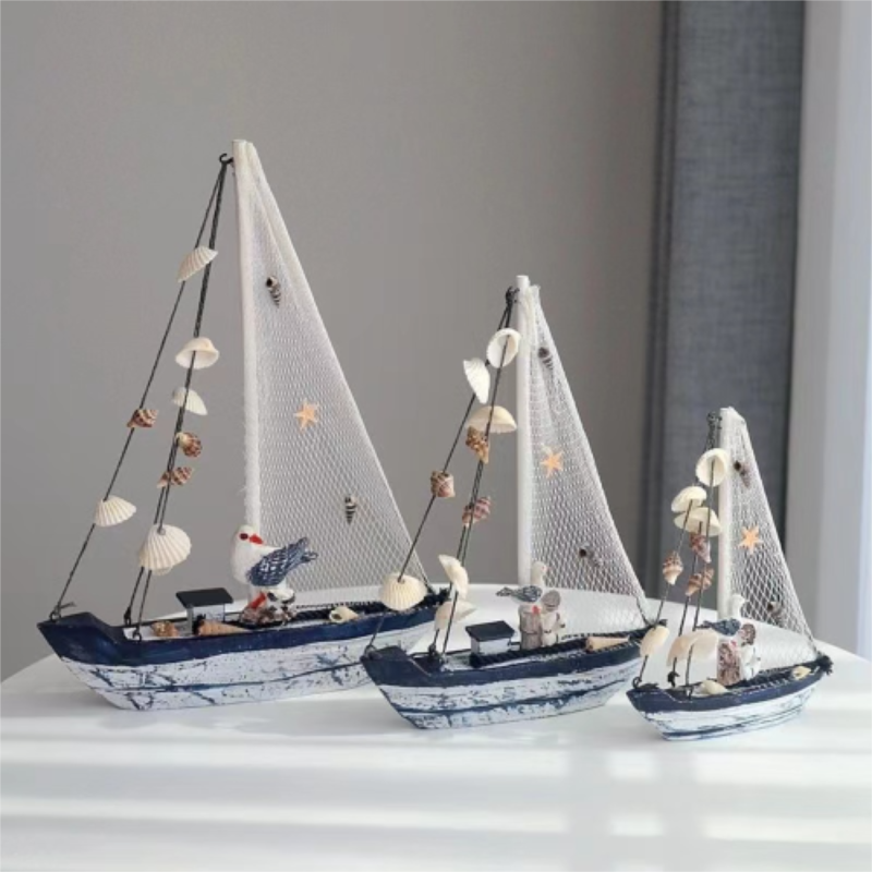 Blue and white shell sailboat style ornament