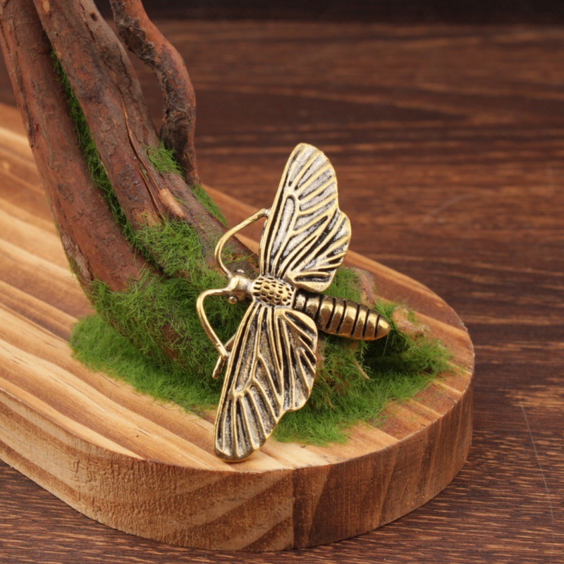 Brass material moth shaped ornament