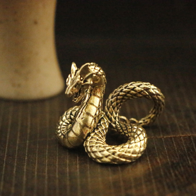 Brass material snake shaped ornament