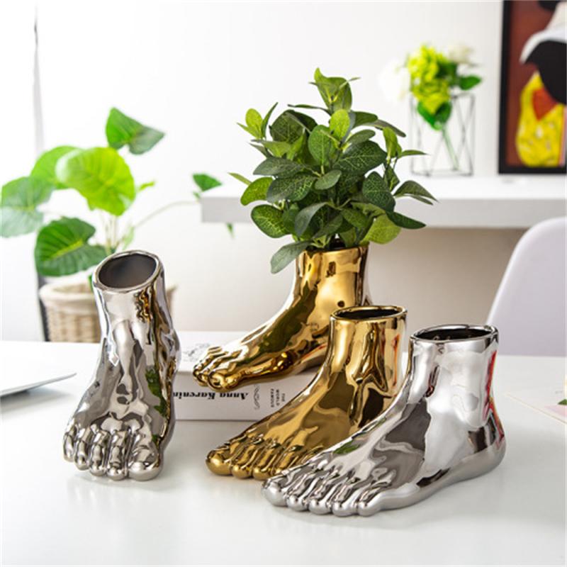 Creative ceramic vase with foot shape