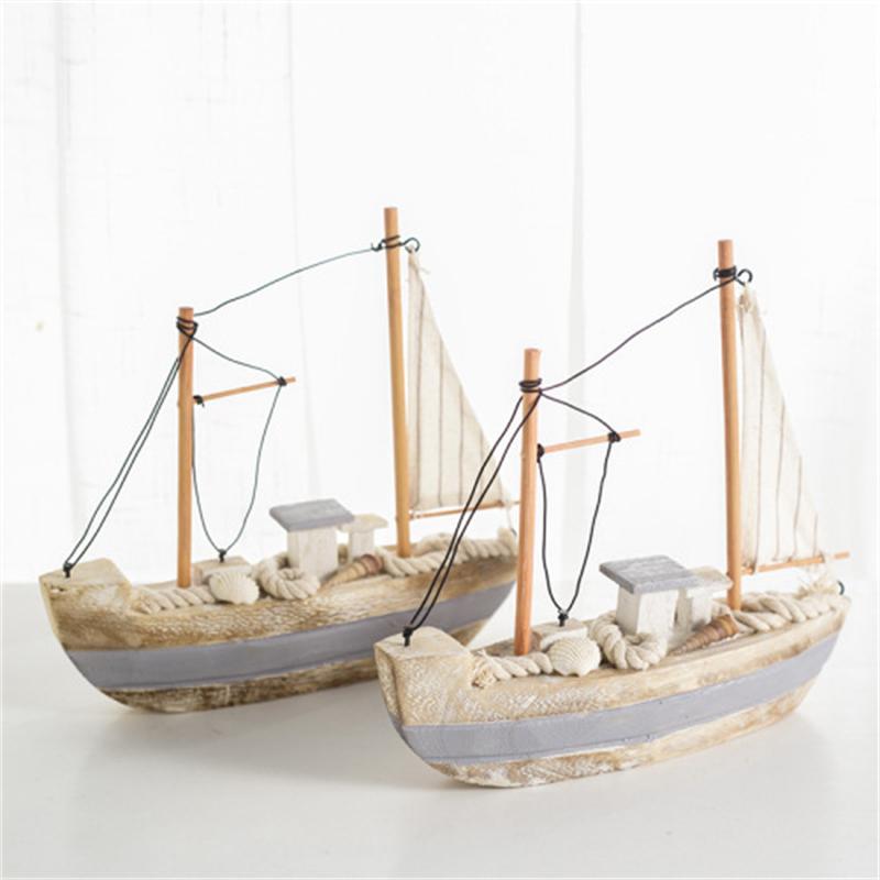 Vintage wooden sailboat shaped ornament
