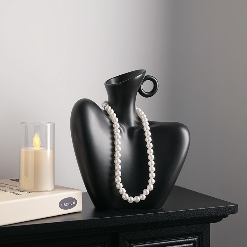 Human collarbone shaped vase – Black and white collarbone vase