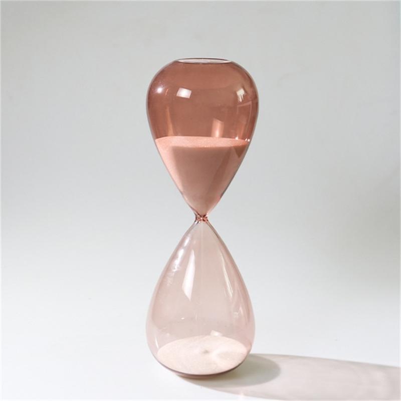 Light brown appearance hourglass glass timer