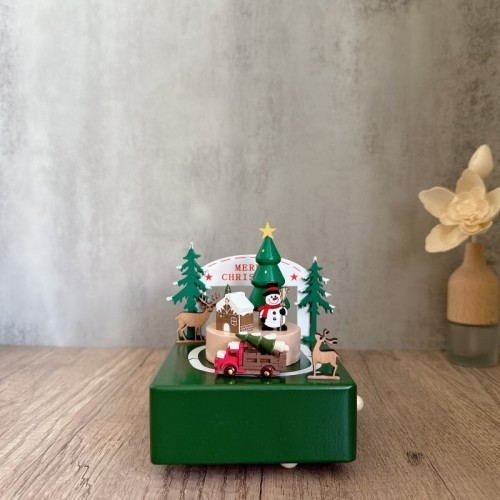 Green Christmas themed wooden rotating music box